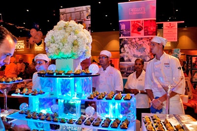 The Hyatt Regency Pier 66 used an ice sculpture to display its mojito-glazed shrimp served with purple potato causa, grilled corn and avocado relish, and saffron aji amarillo sauce.