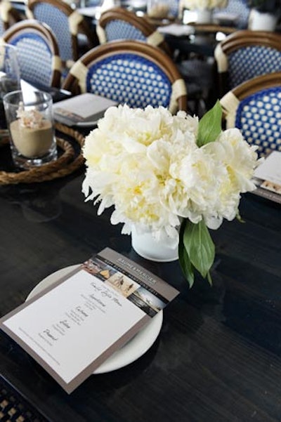 On the second day, Baume & Mercier took over Navy Beach restaurant in Montauk, where specialties—including Montauk clam and corn chowder, Yunnan Ribs, seafood and chips, and Navy Burgers—were served in a setting that boasted arrangements of fresh peonies and ivory roses, as well as nautical rope centerpiece details.