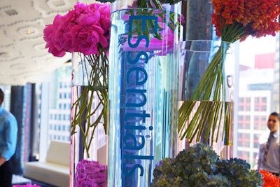 Each vase had the Dermaglow product line that flower colour represented. Blue for their new Essentials line.
