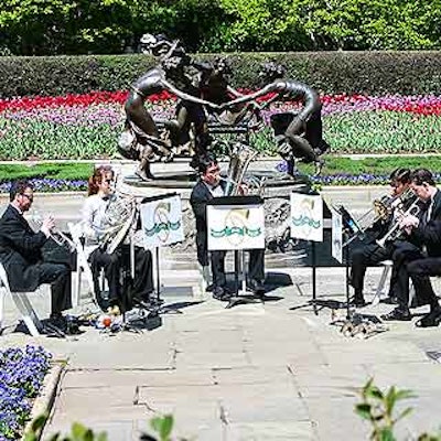 The Central Park Brass played in front of the 'Three Maidens Dancing' fountain.