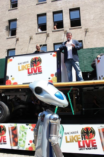 Z100's Elvis Duran (pictured, far right), from 'Elvis Duran and the Morning Show,' acted as the host for the kickoff and was joined by DJ Envy atop the giant skateboard that served as the stage.