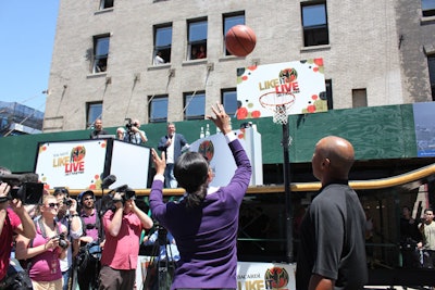 As a sponsor of the N.B.A., Bacardi was able to bring former New York Knicks player John Starks (pictured, far right) to the event. The basketball star, known for the slam-dunk play he made during the 1993 Eastern Conference finals, watched as members of the crowd shot hoops.