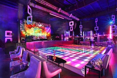 Guests danced on a colorful, light-up dance floor.