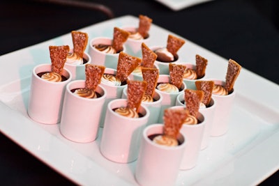 A graham cracker cookie triangle topped the chocolate s'mores pots de crème served at the dessert reception.