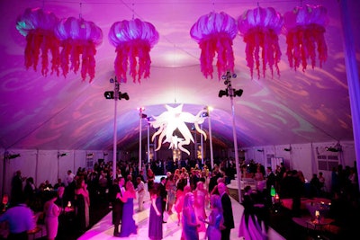 Jellyfish-shaped structures hung above the dance floor in the tent.