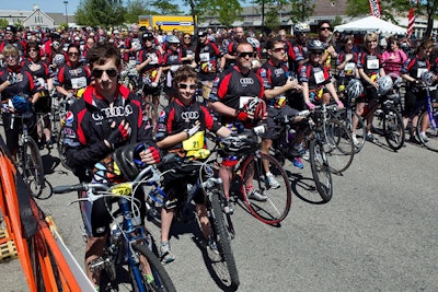 The 100-mile cycle challenge began at Boston's John F. Kennedy Presidential Library on Saturday morning, and ended in Hyannis Port.