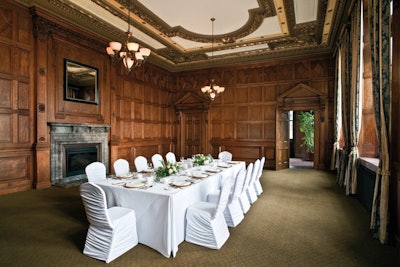 The newly-renovated One King West kept its history intact. The Chairman's Boardroom, with rich wood paneling and ornate fireplace, was once home to the board of directors at the Dominion Bank.