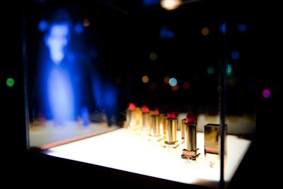 Yves Saint Laurent lipstick was displayed in glass cases.