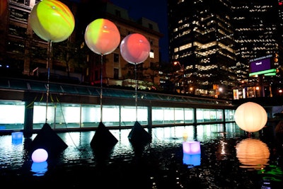 The outdoor lounge offered views of the city and the reflecting pool, which was lit with floating geometrical shapes.