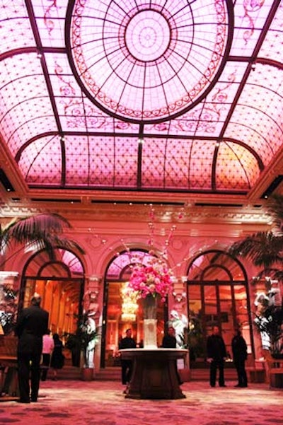 Palm Court was the first section of the Plaza the gala guests entered. To set the scene, Gerald Palumbo of Seasons fashioned an impressive arrangement of pink and purple florals, while Bentley Meeker illuminated the space with a rosy shade of light.