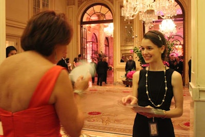 Guests who attended the Tony Awards ceremony at the Beacon Theatre were transported to the Plaza by bus. At the entrance, staffers passed out maps on postcards, which pointed guests to the coat check, food, and activity stations.