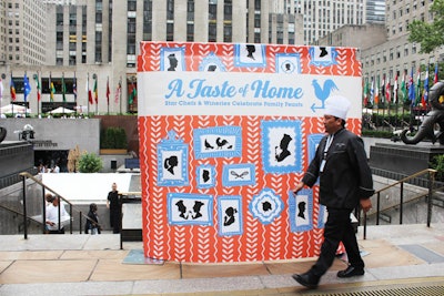 At the top of the steps leading down to the rink, Citymeals hung a large banner decorated with imagery that matched the invitation. The piece also doubled as a backdrop for photos.