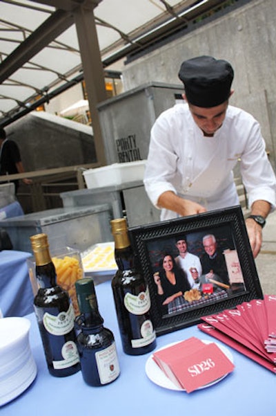 Framed photos of chef and restaurateur families decorated each table. The pictures were also included in the evening's program, which listed the dishes being served, as well as the chef's answers to playful questions like 'What is your earliest food memory?' and 'What was your childhood ambition?'