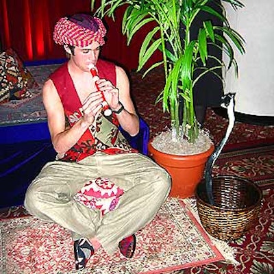 A snake charmer and his faux snake performed outside the tasting reception following the awards.
