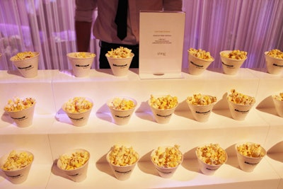 To match the gamer vibe in the Xbox area, a food station held cones of popcorn.