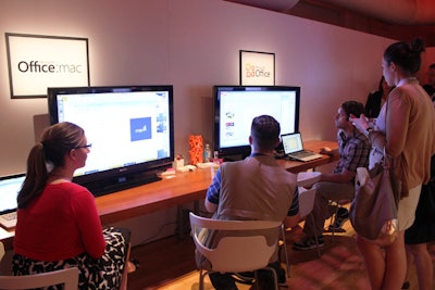 A sparse officelike area served as the spot where Microsoft representatives gave guests a guided tour of the new versions of Microsoft Office for Windows and Mac.