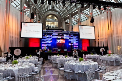 The dinner tables filled the atrium to capacity on its main floor and side balcony's overlooking the space.