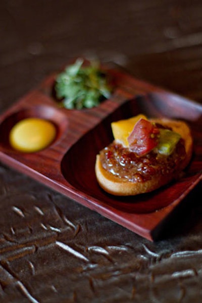 One of the most popular items in the lunch course is Bar J Me's version of a B.L.T.: a rye crostini topped with bacon marmalade and heirloom tomatoes, served with micro arugula and house-made mayo.