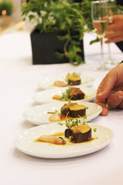 Dishes served at the tasting stations included Black Angus beef tenderloin with Marcona almonds, a picholine olive crust, spring vegetables, and savory jus (pictured), a sweet-pea risotto with morel mushrooms, and chorizo-crusted cod with a cocoa bean puree and sherry vinegar jus.