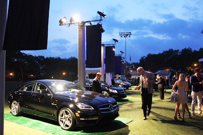 Following the brief ribbon-cutting ceremony, the host opened up the event at De Witt Clinton Park and invited guests to head across the street to the festivities. Van Wyck & Van Wyck placed four of the brand's vehicles on the field to create a tailgate-style setting.