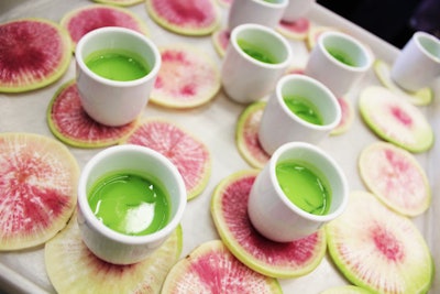 Waiters also passed a selection of canapés, including a chilled minted spring pea soup with tapioca pearls served as a shot (pictured), miniature panini with sun-dried tomatoes, arugula, and pine nuts, and citrus-cured salmon tartlets with a yogurt emulsion.