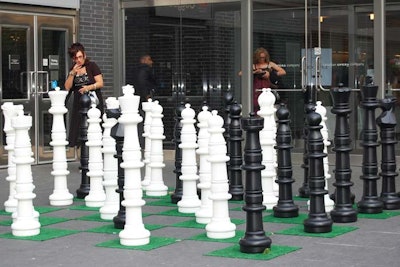 Outside the venue and next to an exit of the Osgoode Subway station, there was a giant chess set. Guests and passersby played and took photos.