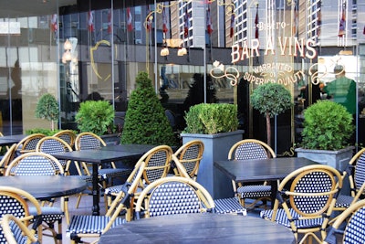 The upper patio of La Société overlooks busy Bloor Street and can seat 50 people.