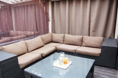 Flowers and a floating votive candle were centrepieces at every table, including the outdoor booths at C Lounge.