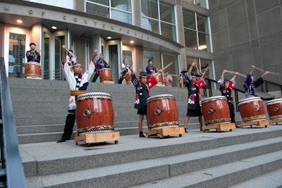 The drum ensemble JASC Tsukasa Taiko performed on the museum's front steps during cocktail hour, attracting sidewalk crowds.