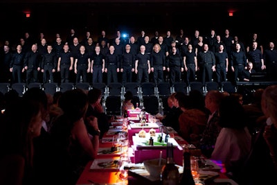 Toward the end of dinner, the Chicago Gay Men's Chorus appeared in the theater to sing an ABBA medley and then escort guests to the cocktail reception.