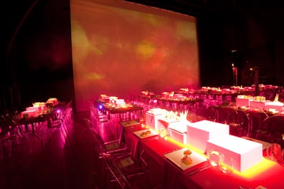 Event Creative designed a pink lighting scheme, and Heffernan Morgan Ronsley employed pink box centerpieces and orange table covers. Wolfgang Puck Catering's meal included fried green tomatoes, balsamic watermelon salad, and buttermilk fried chicken with flower cherry honey.