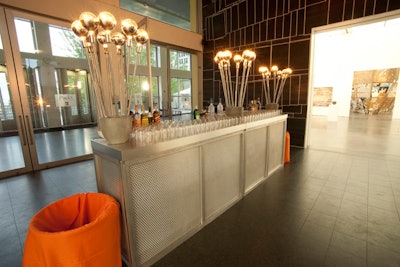 Silver bars anchored both ends of the reception space.