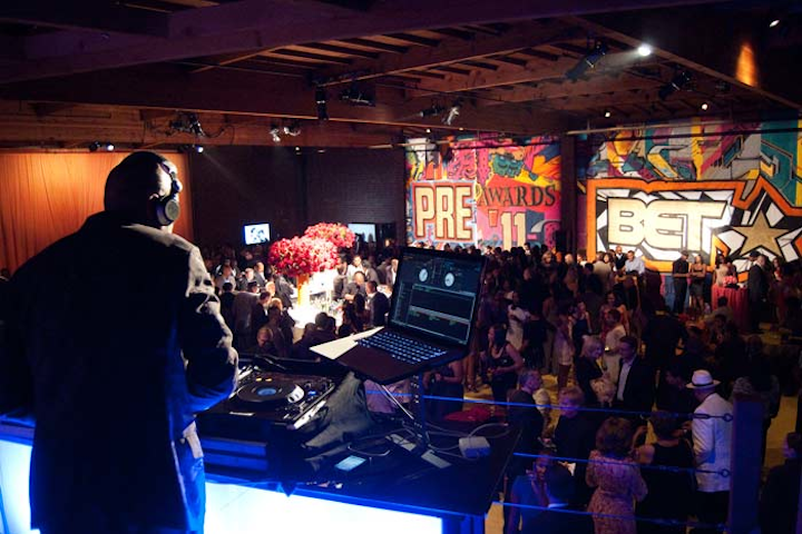 Graffiti-style lettering announced the evening's host.