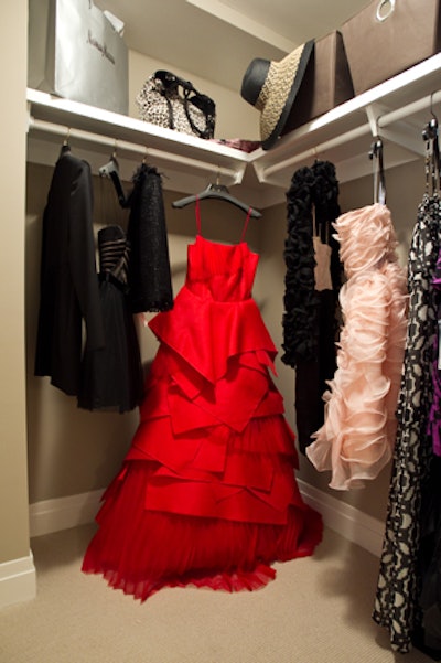 Gowns from Oscar de la Renta helped create the Carrie's Closet display in two closets of the apartment.