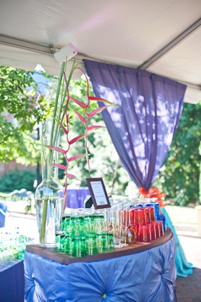 Different styles of glasses matching the night's palette topped each of the bars.