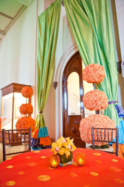 Wells designed the event using a vibrant palette of orange, green, yellow, blue, and purple.