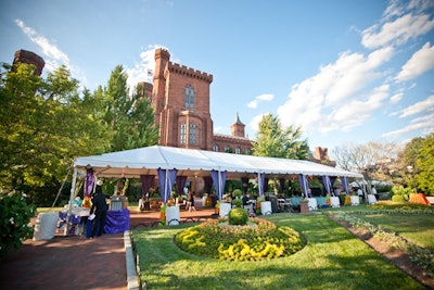 Sugarplum Tents erected a rectangular tent housing additional seating, bars, the dessert buffet, and a salsa band in the back garden of the castle.
