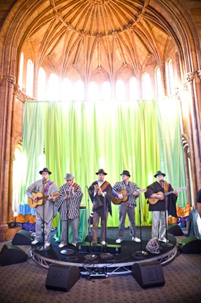 A Vista Events set up a small stage with simple drape background for the music and dance performances in the commons.