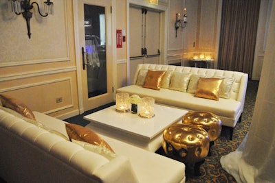 In the V.I.P. lounge, white sofas were lined with gold and white pillows. The jeweled gold ottomans were custom-made according to planner Nadia Di Donato's specifications.