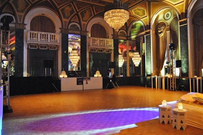 The large dance floor was kept clear of furniture in anticipation of the large number of guests.