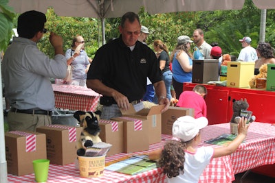 The tented Blue Bell Ice Cream booth donated the proceeds to its Scoops for Conservation Fund.