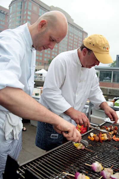 Chefs used grills to prepare summery snacks like meat-and-veggie kebabs.