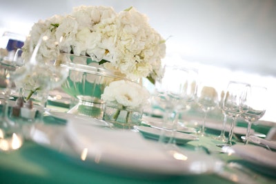 White linens topped tables, lending the look of the iconic Tiffany box.