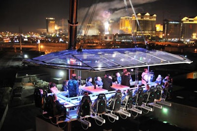 Dinner in the Sky offers guests the experience of dining at a table suspended in the air.