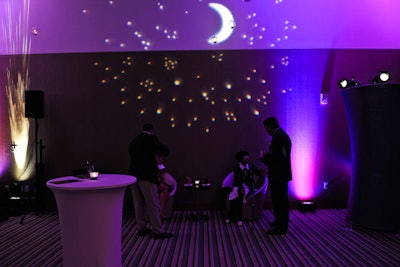 Moons, stars, and candlelit hanging orbs also decorated the space.