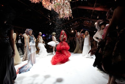 Naked Heart Foundation founder and model Natalia Vodianova (pictured, center) wore a custom Valentino dress for the show's finale.