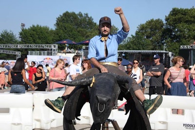 After signing a waiver, attendees could ride one of two mechanical bulls made from used tires.
