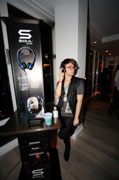 Headphones brand Soul by Ludacris set up listening stations at the promotion, allowing guests like Christian Siriano (pictured) to check out the product as well as music by the rapper.