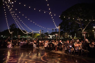 String lights overhead provided a warm glow and a sense of intimacy under the open sky.