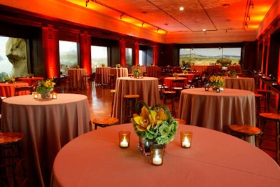 Cocktail tables in muted, neutral tones filled the space.